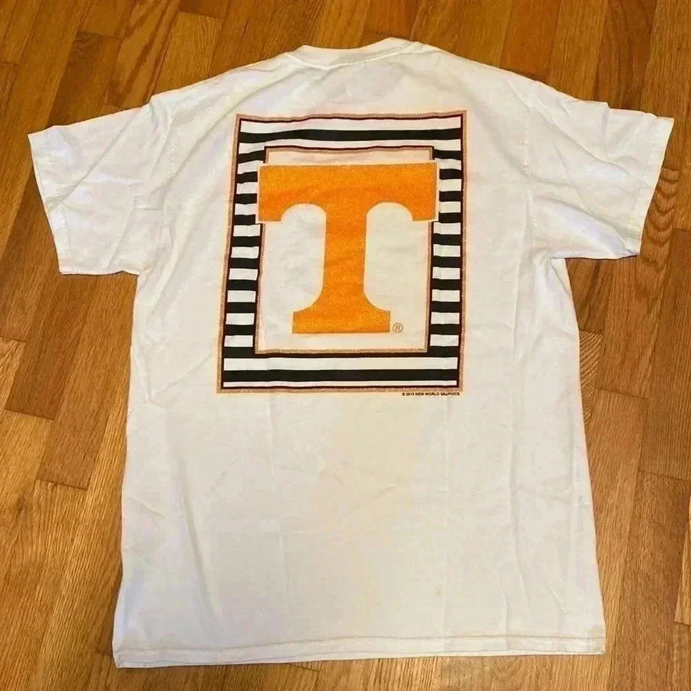 Woman’s Tennessee White & Orange Short Sleeve, Medium Shirt With Sparkle Design.